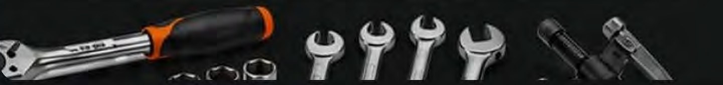 Screwdriver, socket set and spanners used for careful repair work